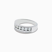The Mens 14K White Gold Diamond Double Channel Set Ring showcases two parallel rows of round-cut white diamonds on a wide band, exuding timeless sophistication and bold style against a plain white background.