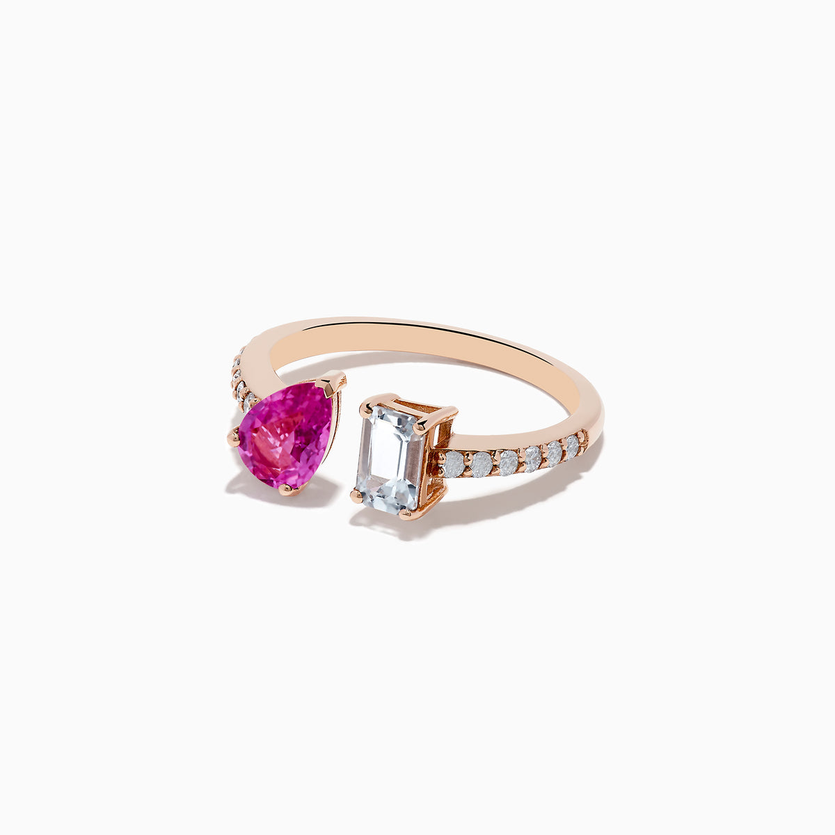 The 14K Gold Diamond, Pink and White Sapphire Toi Et Moi Ring features a pear-shaped pink sapphire, an emerald-cut white sapphire, and sparkling diamonds along the modern band.