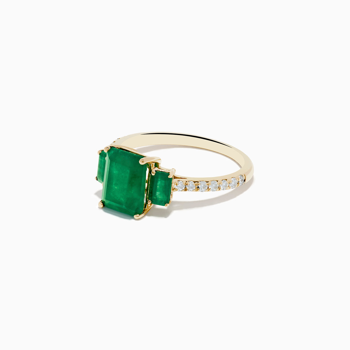 The Brasilica 14K Yellow Gold Emerald and Diamond Ring showcases a large rectangular emerald center, two smaller side emeralds, and diamond accents on the band.