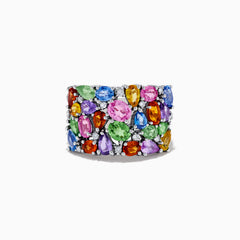 The Watercolors 14K White Gold Multi Sapphire and Diamond Ring features a wide band adorned with vibrant, closely set sapphires in various colors, shapes, and sizes alongside sparkling diamonds for a colorful, eye-catching design.
