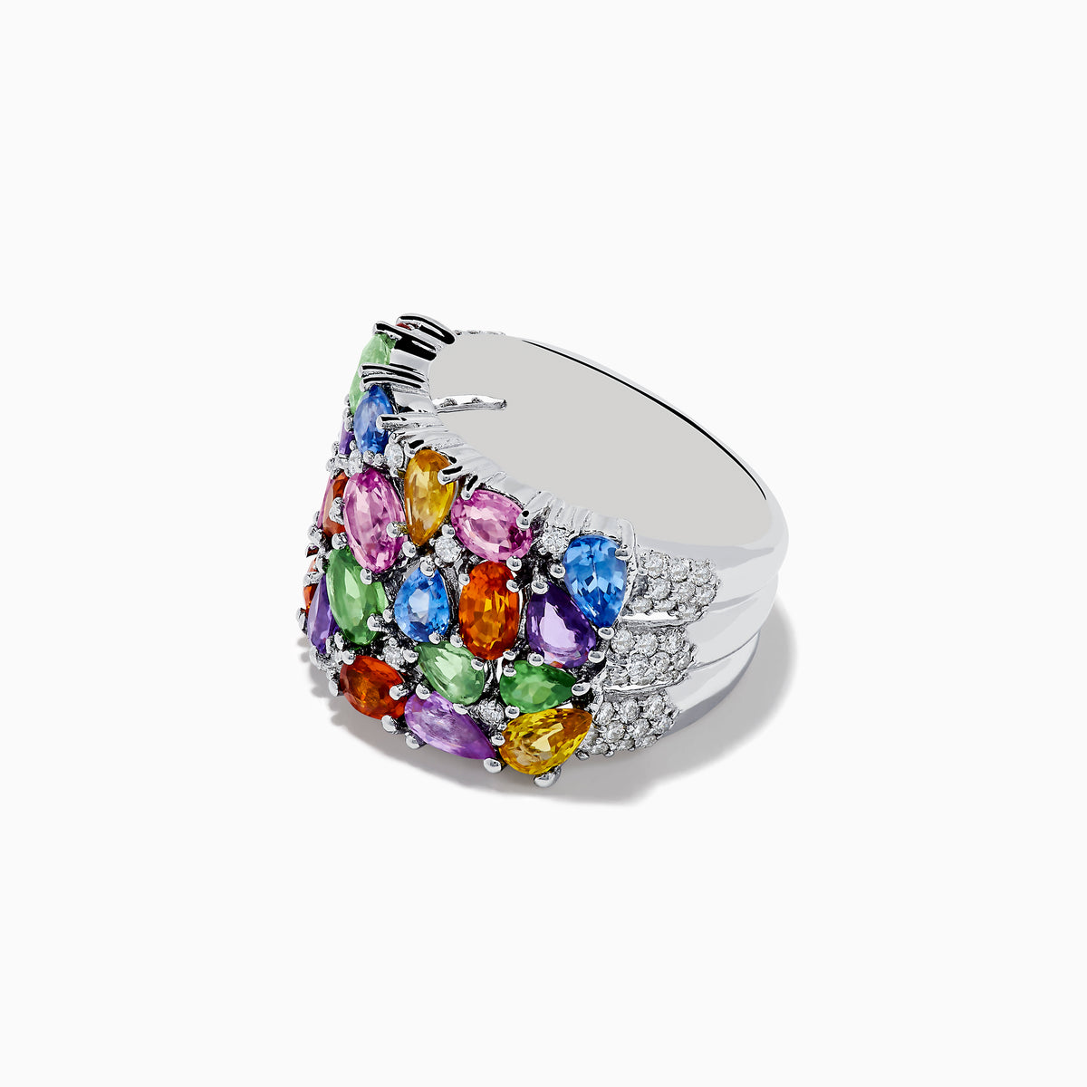 The Watercolors 14K White Gold Multi Sapphire and Diamond Ring features a wide band adorned with vibrant, closely set sapphires in various colors, shapes, and sizes alongside sparkling diamonds for a colorful, eye-catching design.