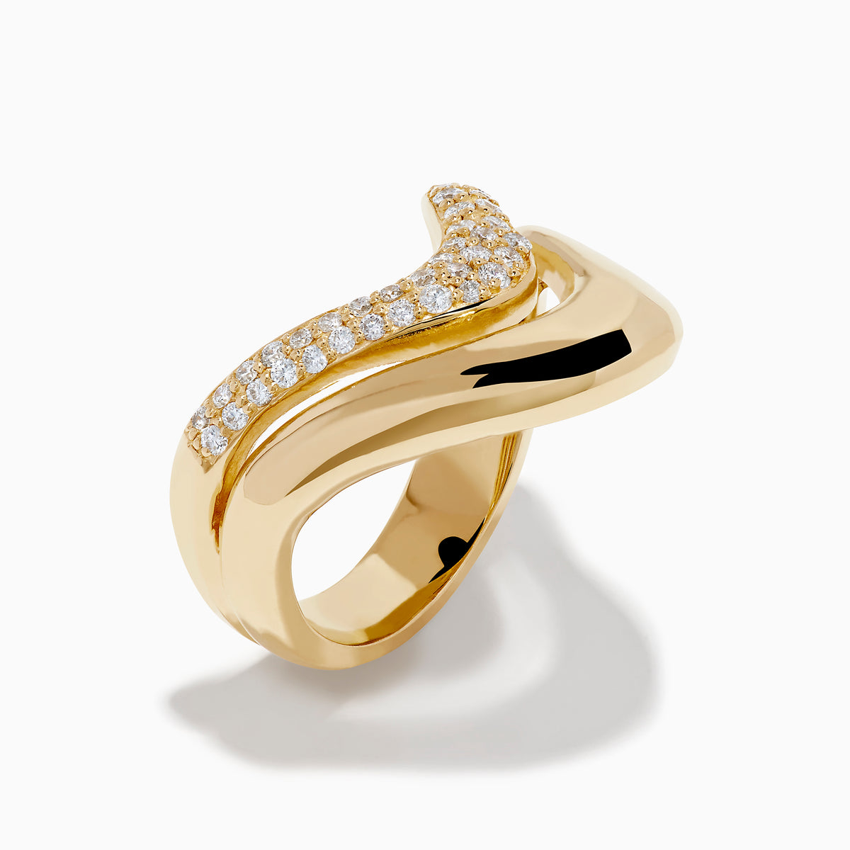 The 14K Yellow Gold Diamond Sculptural Ribbon Ring features a wavy V-shaped design with a sparkling diamond ribbon band above a polished gold band, creating an elegant two-layer look.