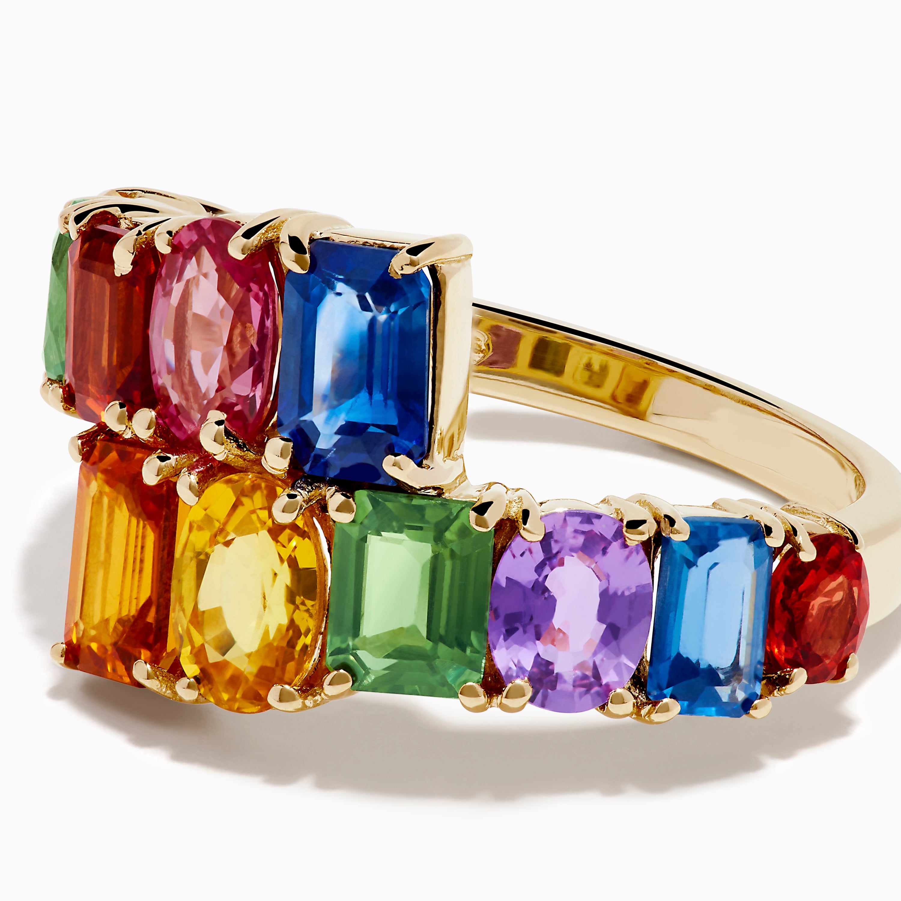 The Watercolors 14K Yellow Gold Multi Sapphire Bypass Ring showcases two rows of vibrant, rectangular sapphires—green, pink, blue, orange, yellow, and purple—in a staggered open-ended design.