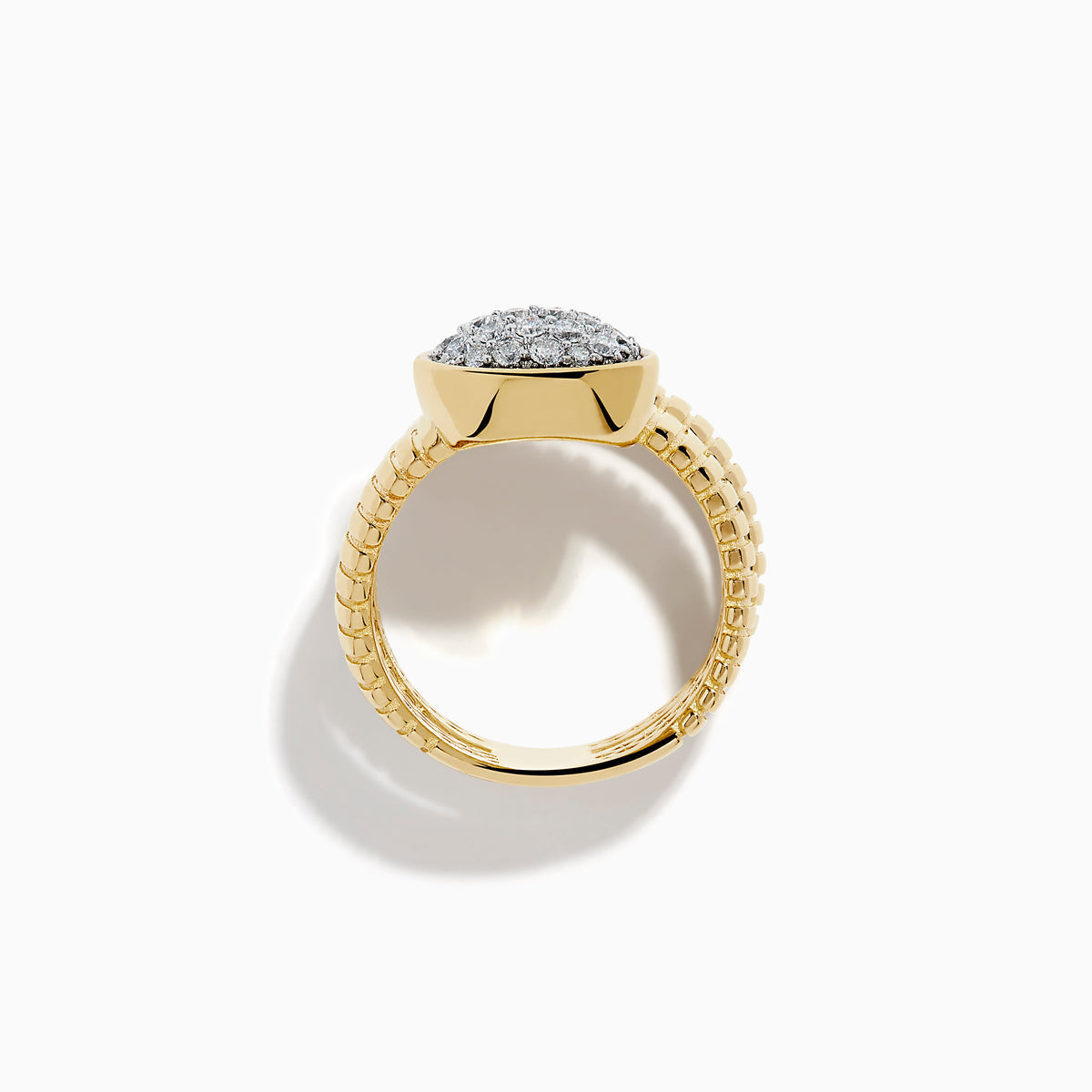 The D'oro 14K Two-Tone Gold Wrap Diamond Ring has a ribbed, coiled design with an oval top set with multiple small diamonds, spiraling upward in three elegant loops against a white background.