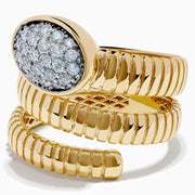 The D'oro 14K Two-Tone Gold Wrap Diamond Ring has a ribbed, coiled design with an oval top set with multiple small diamonds, spiraling upward in three elegant loops against a white background.