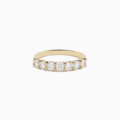 The DOro 14K Yellow Gold Round Brilliant Diamond Band 1.03 TCW showcases a row of sparkling round brilliant diamonds on a sleek yellow gold band, displayed against a plain white background.