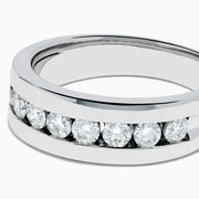 Men's 14K White Gold Channel Set Diamond Band featuring a row of round, clear diamonds elegantly set across the front, showcased on a plain white background.