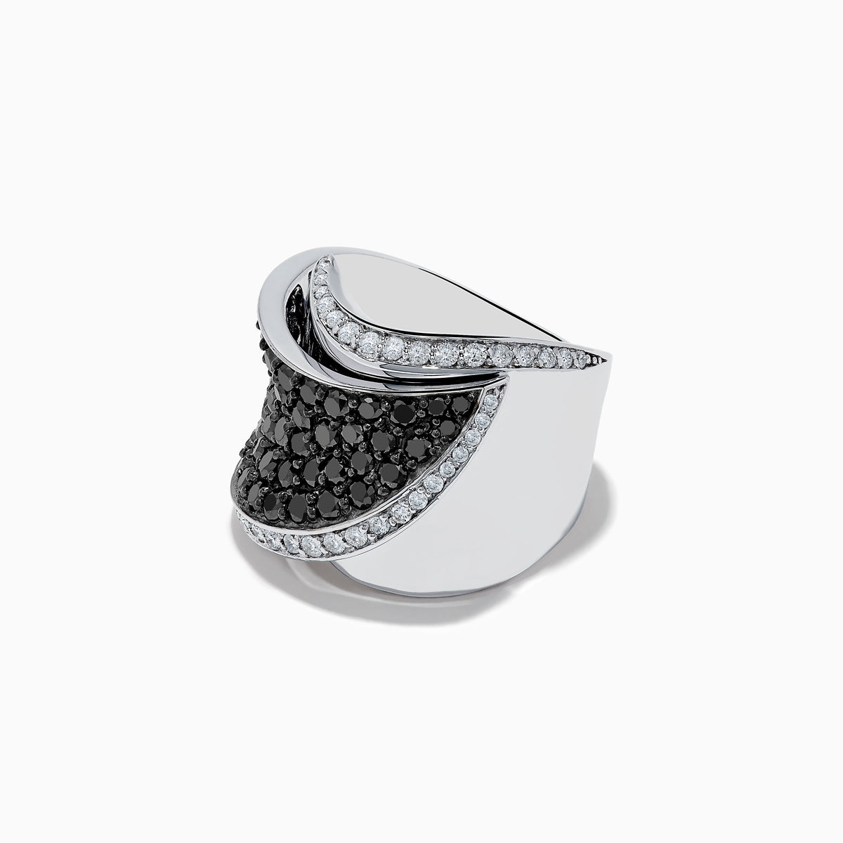 The 14K White Gold Black and White Diamond Ring features a wide, curved design with black and white diamonds at the center, bordered by clear stones along the edges, all set against a white background.