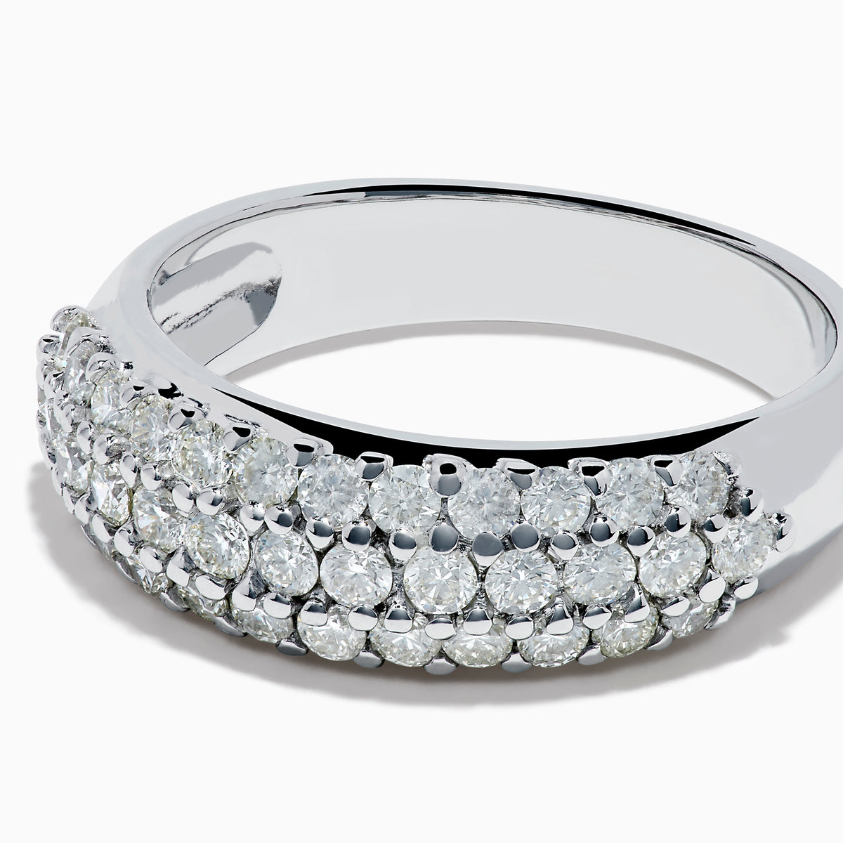 The 14K White Gold 3 Row Pave Diamond Dome Band showcases three closely set rows of pave diamonds, crafted in a sleek dome design and presented on a plain white background.