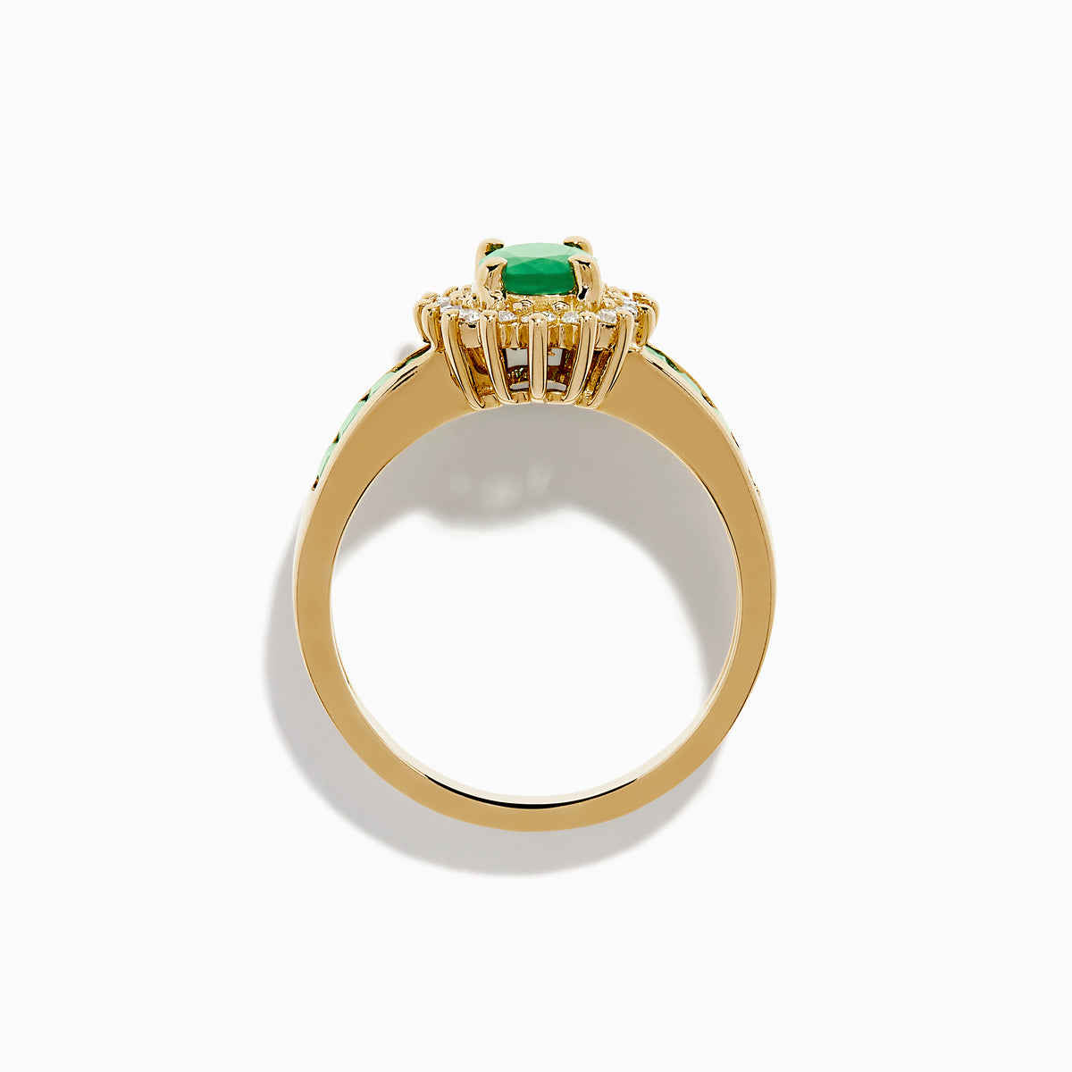 The Brasilica 14K Yellow Gold Emerald and Diamond Ring features an oval emerald center, sparkling diamonds, and elegant green inlays along the band.