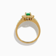 The Brasilica 14K Yellow Gold Emerald and Diamond Ring features an oval emerald center, sparkling diamonds, and elegant green inlays along the band.