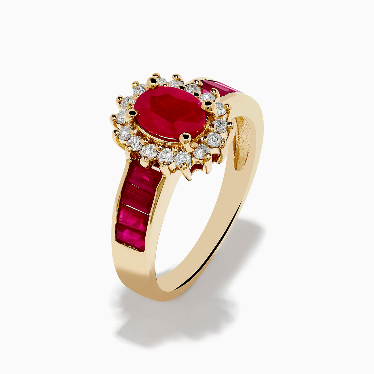 The Ruby Royale 14K Yellow Gold Ruby and Diamond Ring showcases an oval ruby centerpiece, surrounded by white diamonds and accented with rectangular red stones along the band.