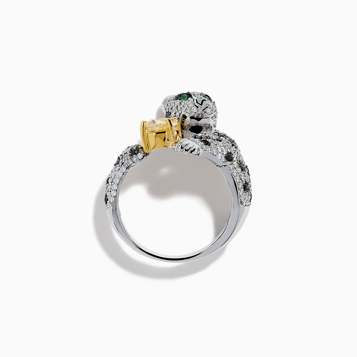 Introducing the Signature 18K White Gold Yellow Diamond Panther Ring—a stunning piece shaped like a panther and meticulously set with black and white diamonds. This captivating ring features vivid green eyes and displays a large yellow diamond held gracefully in its paws.