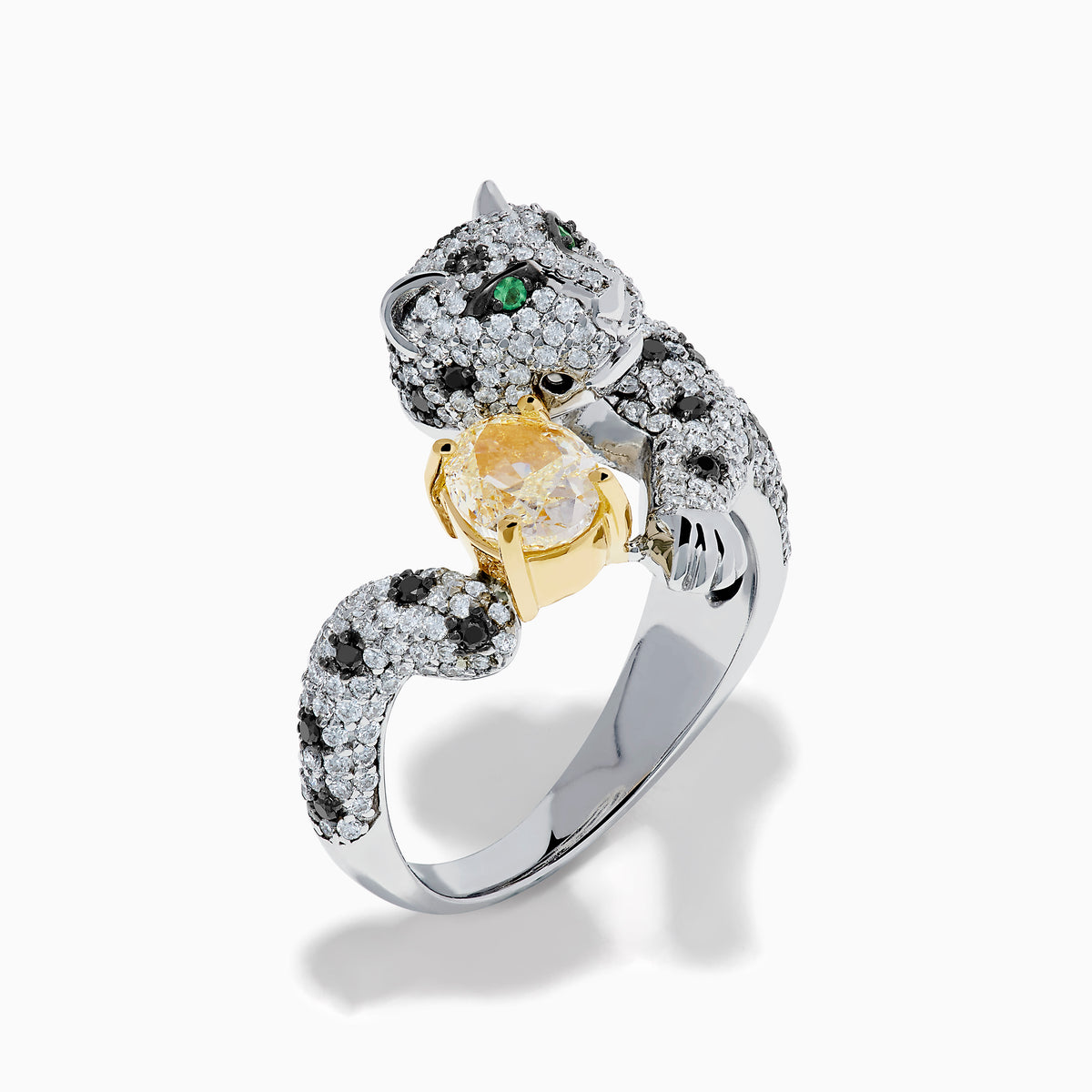 Introducing the Signature 18K White Gold Yellow Diamond Panther Ring—a stunning piece shaped like a panther and meticulously set with black and white diamonds. This captivating ring features vivid green eyes and displays a large yellow diamond held gracefully in its paws.