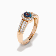 The 18K Rose Gold IGI Certified Alexandrite and Diamond Ring features an oval alexandrite center, a halo of white diamonds, and diamond-accented rows along the band.