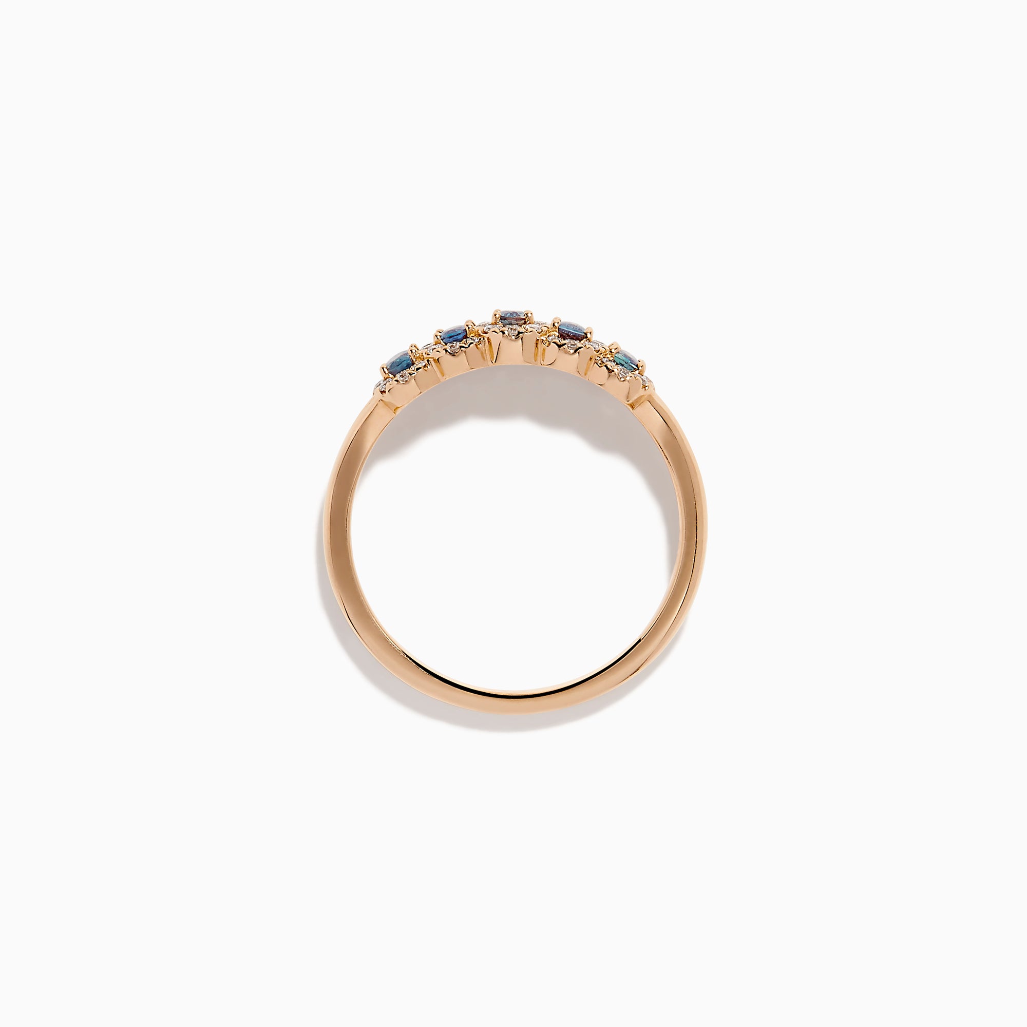 The 18K Rose Gold Alexandrite and Diamond Ring features five oval alexandrites, each encircled by sparkling white diamonds, showcased against a white background.