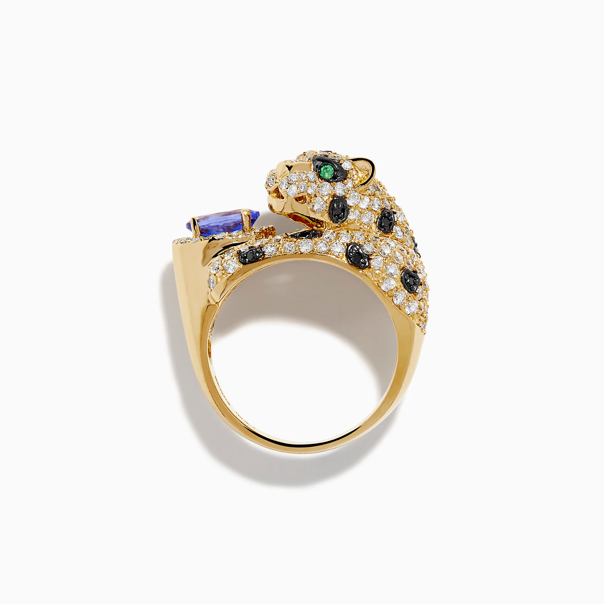 The Signature 14K Yellow Gold Tanzanite and Diamond Panther Ring showcases a sculpted panther with green gemstone eyes, diamond and black stone accents, holding an oval tanzanite gemstone.