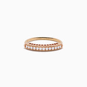 The 14K Rose Gold Flexible Size 7-10 Diamond Ring showcases a row of small, round white diamonds along the band and is shown on a plain white background. Adjustable fit ensures comfort for any occasion.