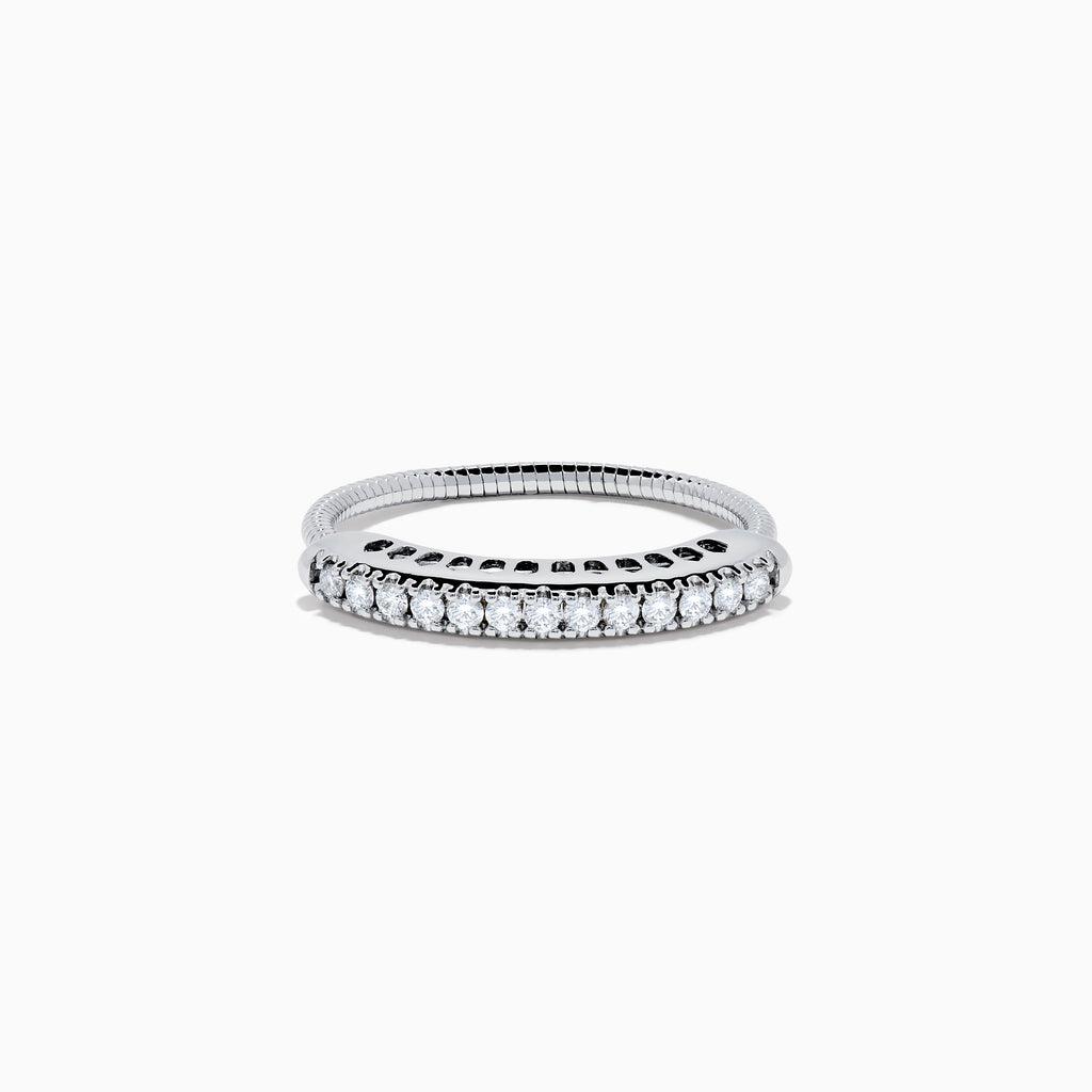 The 14K White Gold Flexible Size 7-10 Diamond Ring features a row of small round diamonds along the top and is displayed on a plain white background.