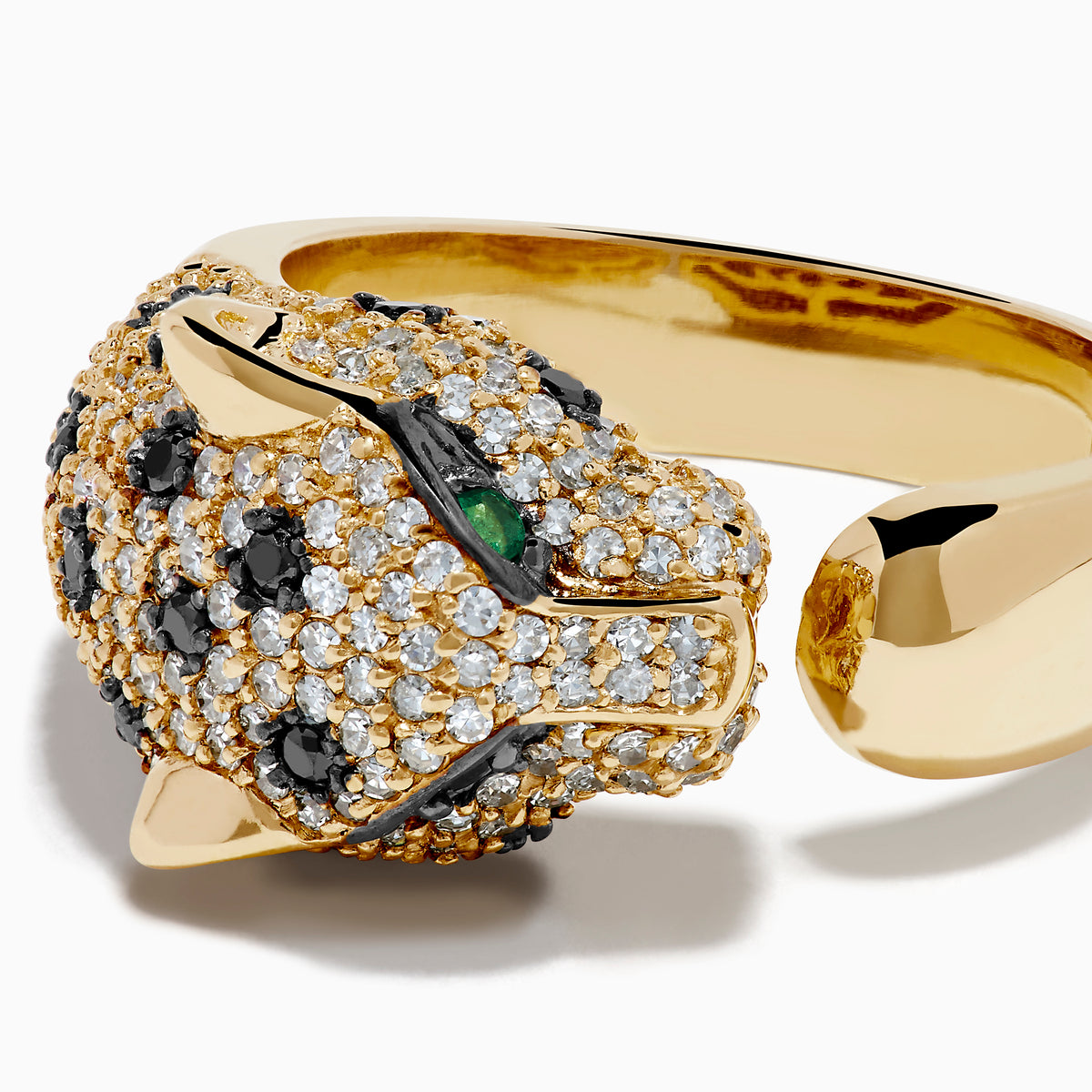 The Signature 14K Yellow Gold Diamond Spotted Panther Ring features a panther’s head adorned with white and black gemstones and vibrant green stones for the eyes.