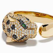 The Signature 14K Yellow Gold Diamond Spotted Panther Ring features a panther’s head adorned with white and black gemstones and vibrant green stones for the eyes.