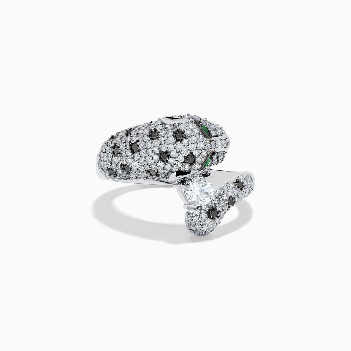 The Signature 14K White Gold Diamond Bypass Panther Ring features white and black diamond clusters, two green gemstone eyes, and a large central diamond set in the panther’s mouth.