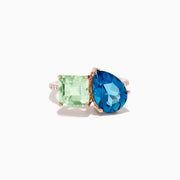 The 14K Gold Diamond, Green Amethyst, and London Blue Topaz Toi Et Moi Ring features a square-cut green amethyst and a pear-shaped London blue topaz side by side in a split shank design, shown on a white background.