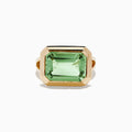 The 14K Yellow Gold Green Amethyst Ring features a striking emerald-cut gemstone in a simple, thick gold band, showcased on a white background.