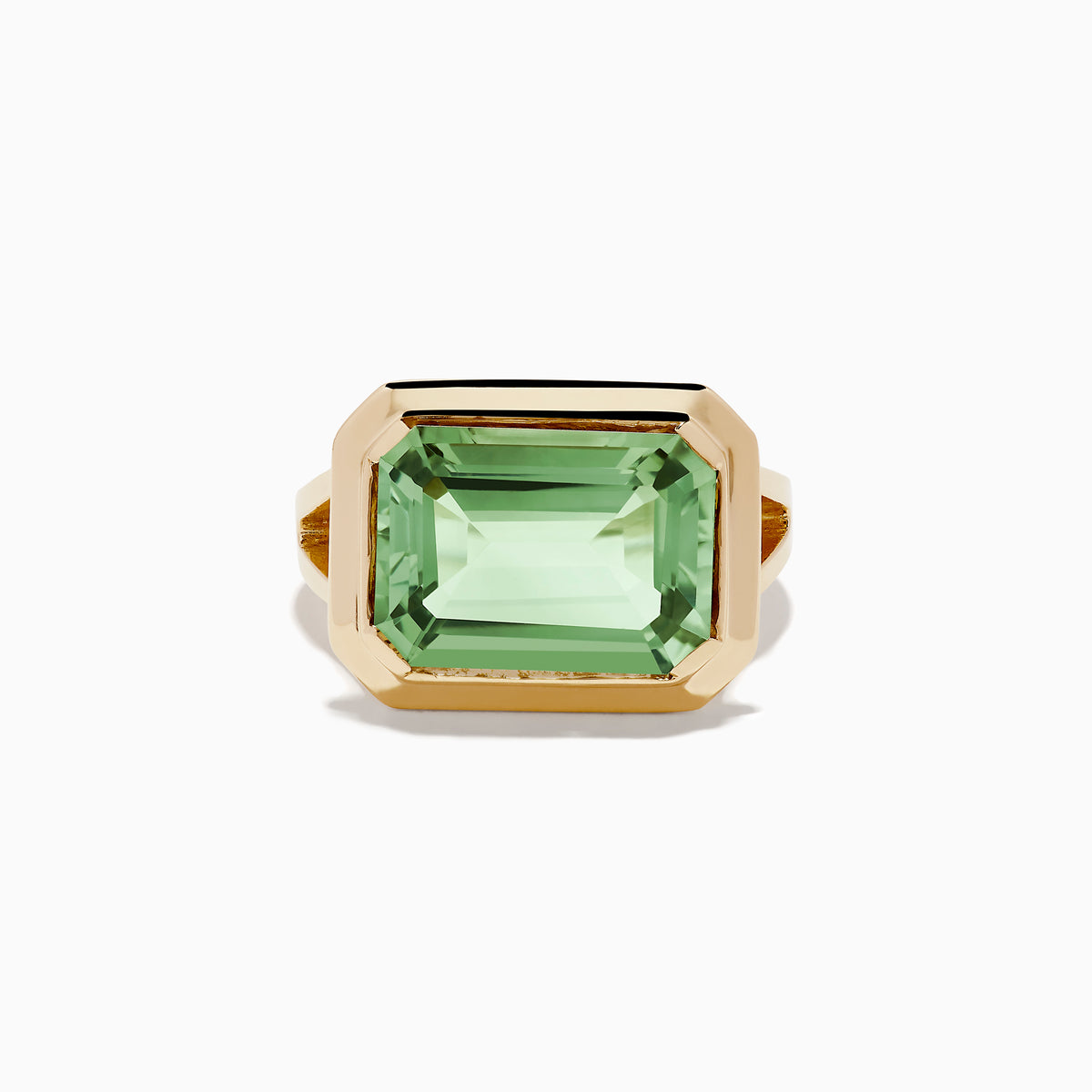 The 14K Yellow Gold Green Amethyst Ring features a striking emerald-cut gemstone in a simple, thick gold band, showcased on a white background.