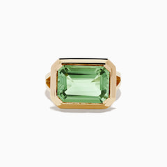 The 14K Yellow Gold Green Amethyst Ring features a striking emerald-cut gemstone in a simple, thick gold band, showcased on a white background.