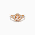 The Rose Gold Morganite and Diamond Split Halo Ring showcases an oval peach-colored Morganite center, encircled by a sparkling diamond split halo with additional diamonds along the band.