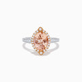 The Blush 14K Two-Tone Gold Morganite and Diamond Ring showcases a marquise-cut peach morganite with a halo of white diamonds set on an elegant gold and silver band for a unique, eye-catching look.