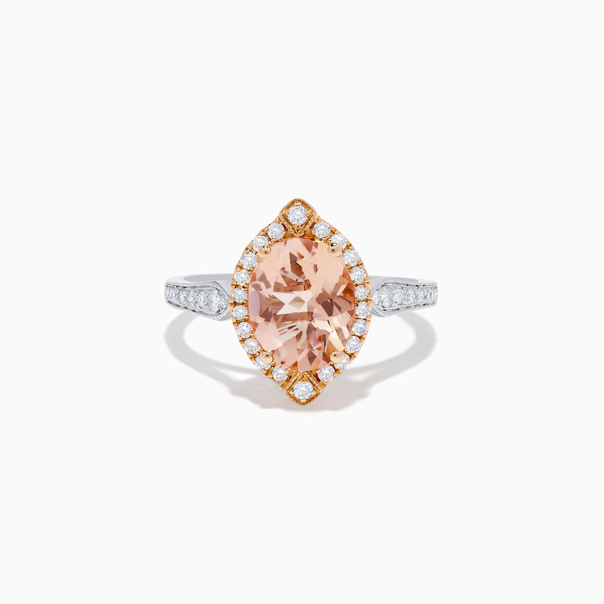 The Blush 14K Two-Tone Gold Morganite and Diamond Ring showcases a marquise-cut peach morganite with a halo of white diamonds set on an elegant gold and silver band for a unique, eye-catching look.