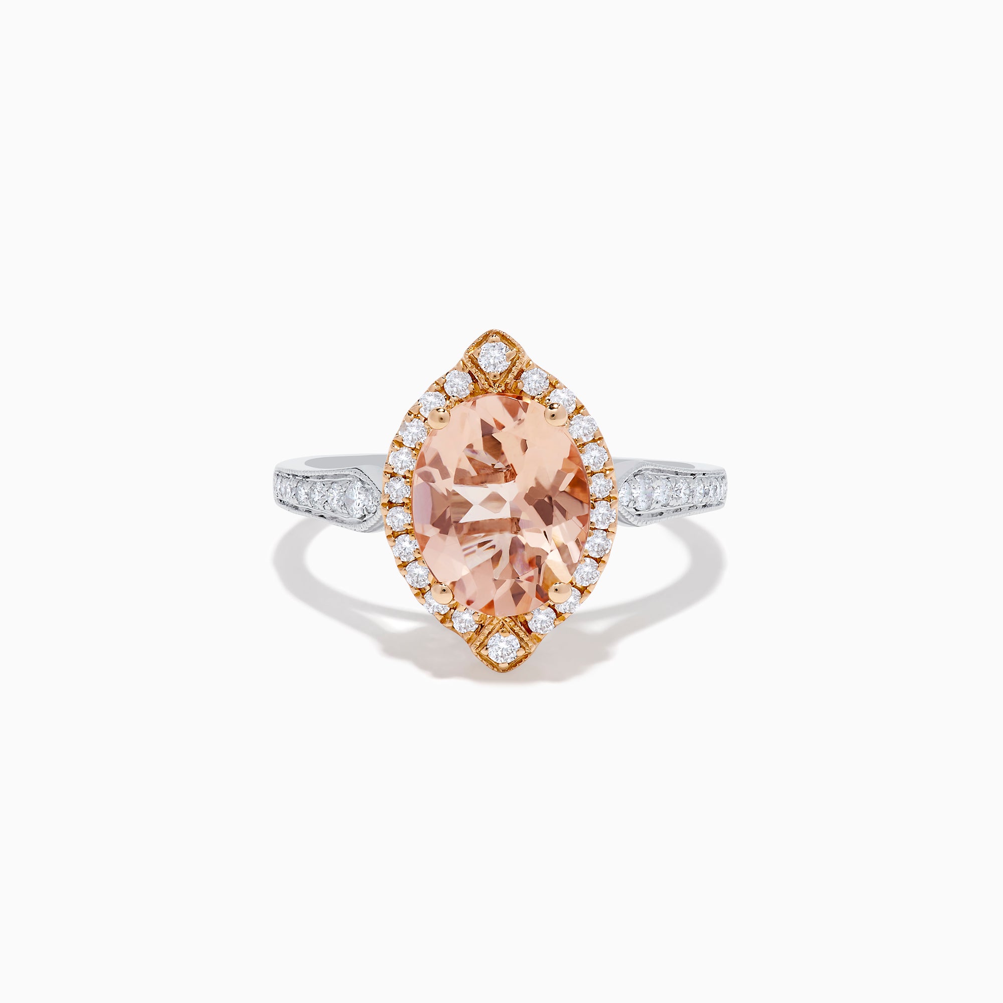 The Blush 14K Two-Tone Gold Morganite and Diamond Ring showcases a marquise-cut peach morganite with a halo of white diamonds set on an elegant gold and silver band for a unique, eye-catching look.