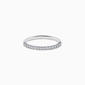 Displayed on a plain white background, the 14K White Gold Pave Diamond Band 0.14 TCW features a single row of small, sparkling diamonds set along the top half of its slim band.