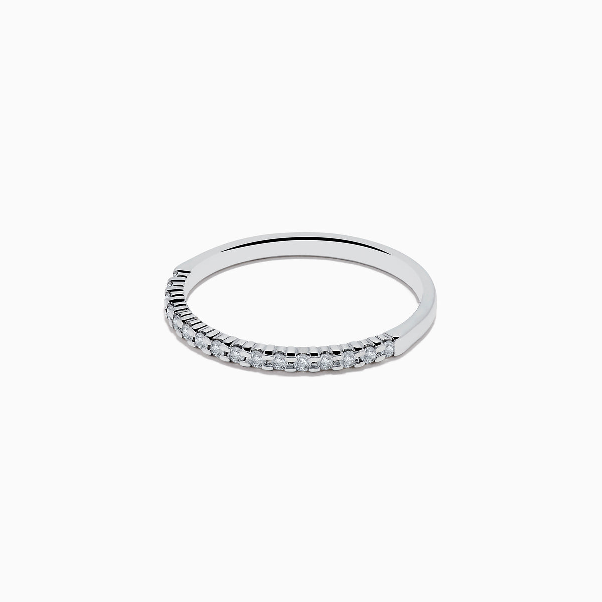 Displayed on a plain white background, the 14K White Gold Pave Diamond Band 0.14 TCW features a single row of small, sparkling diamonds set along the top half of its slim band.