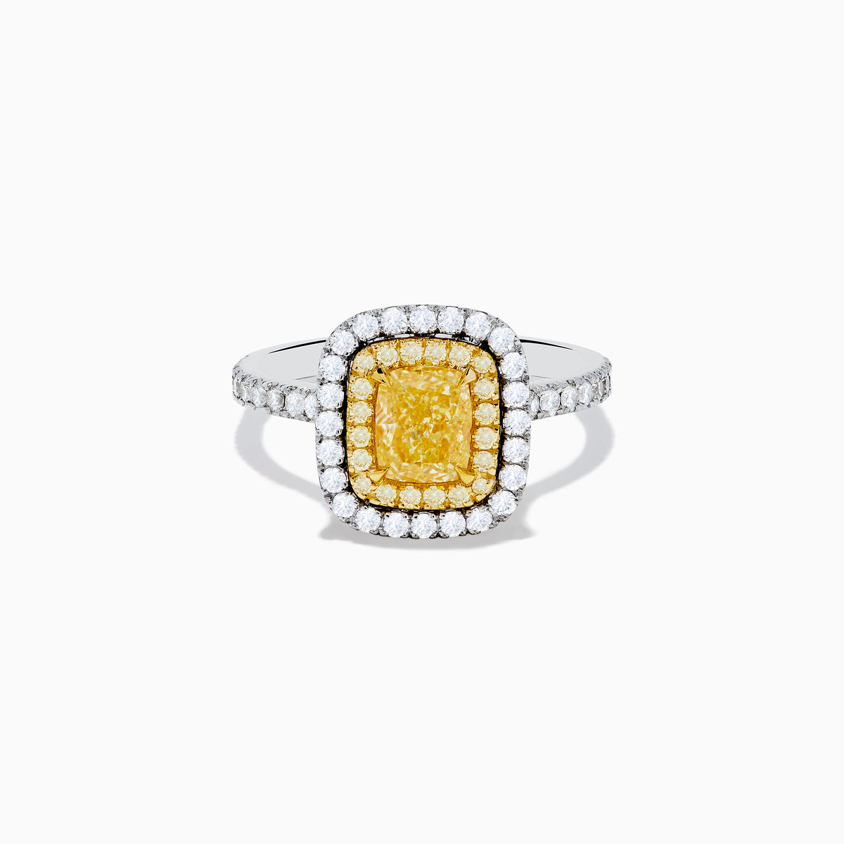 The 18K Two Toned Gold GIA certified Yellow and White Diamond Halo Ring features a rectangular yellow center stone, double halos of white diamonds, and extra diamonds along the band for exceptional brilliance.