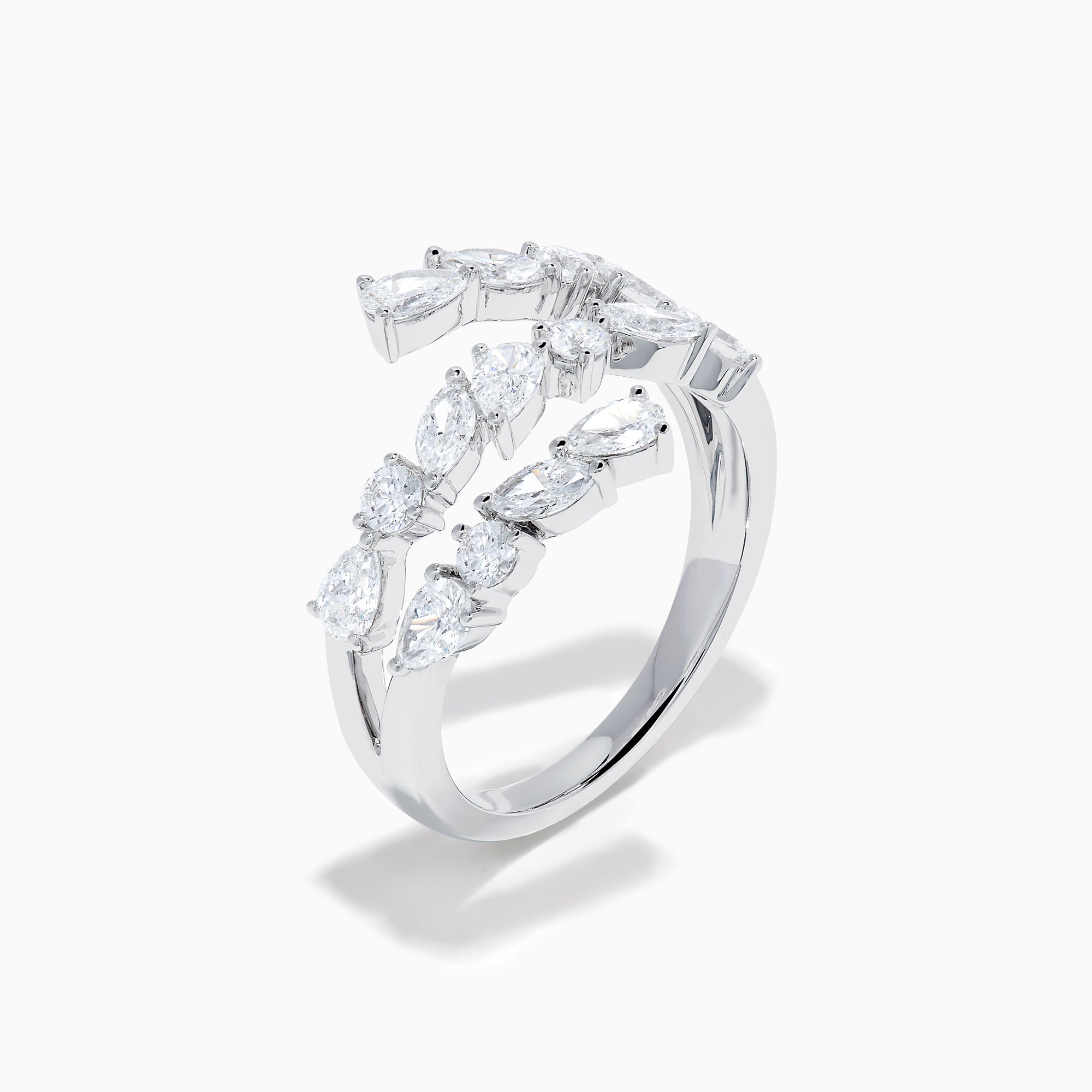 The Lab Grown Multi Shaped Diamond 1.23ct Wrap Ring in 14K White Gold features pear and round lab grown diamonds in a leaf-inspired, open front design, shown against a white background.