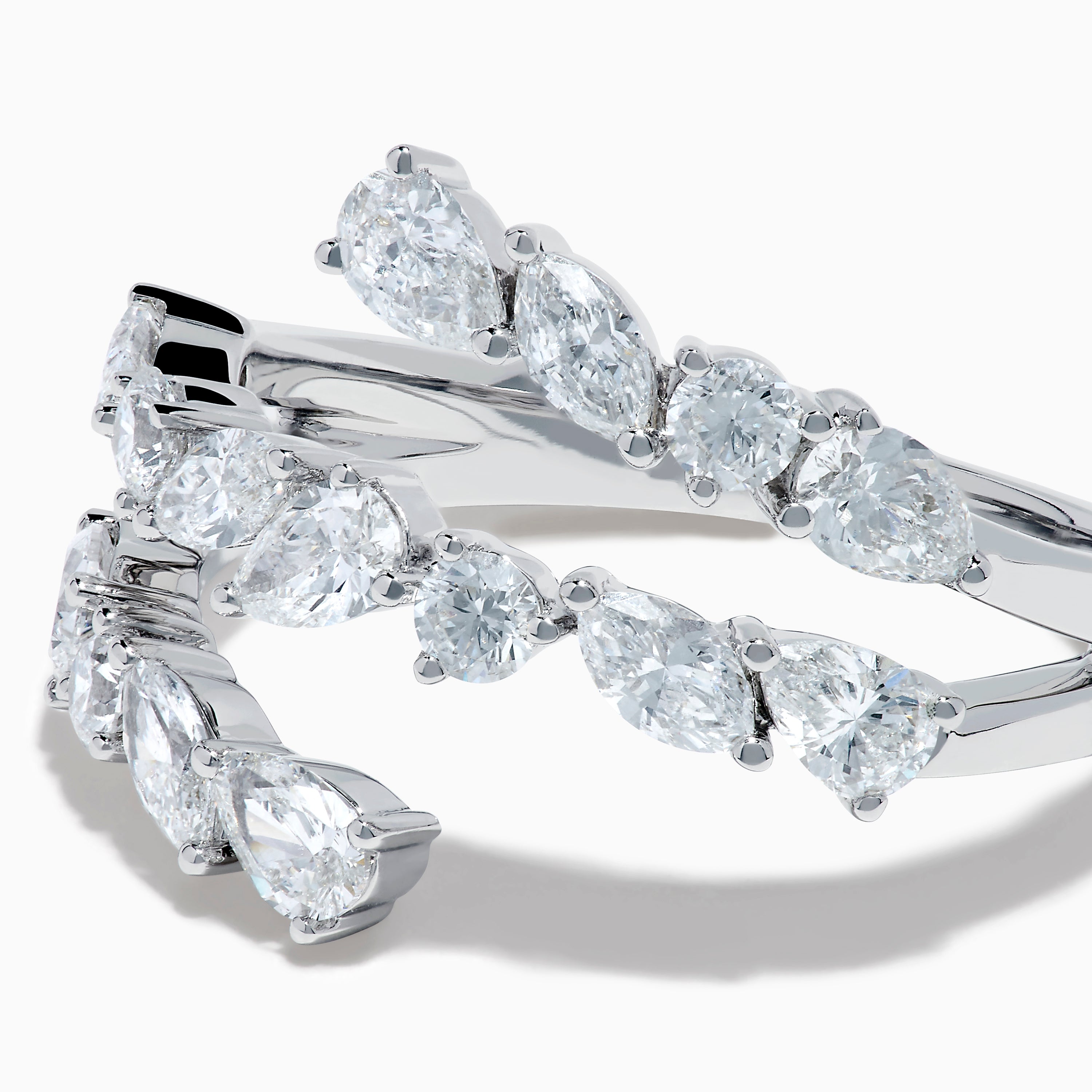 The Lab Grown Multi Shaped Diamond 1.23ct Wrap Ring in 14K White Gold features pear and round lab grown diamonds in a leaf-inspired, open front design, shown against a white background.