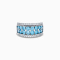 The Lab Grown Blue and White Diamond Statement Ring in 14K White Gold showcases rows of vivid blue gems bordered by sparkling lab grown diamonds for an elegant, standout look.