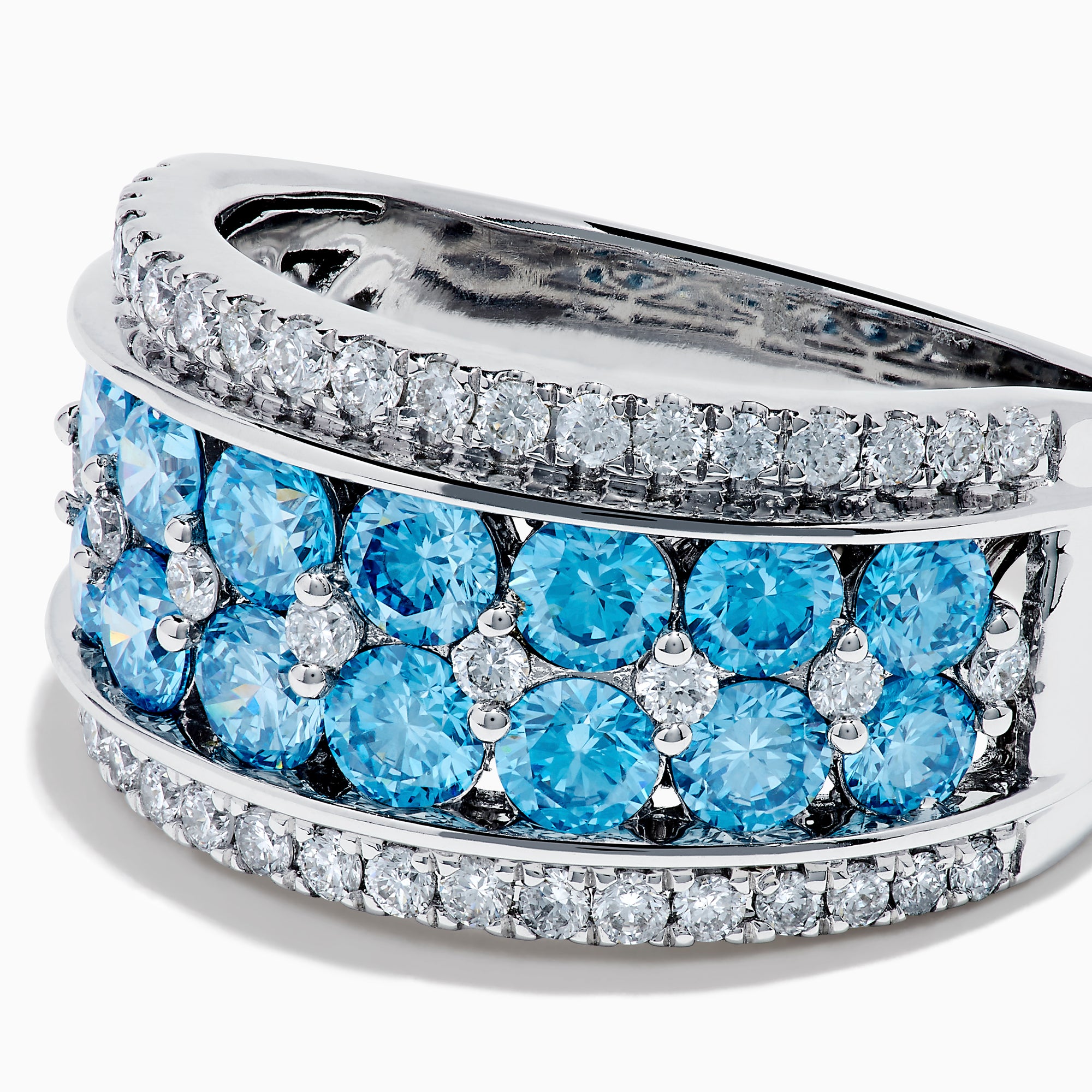 The Lab Grown Blue and White Diamond Statement Ring in 14K White Gold showcases rows of vivid blue gems bordered by sparkling lab grown diamonds for an elegant, standout look.