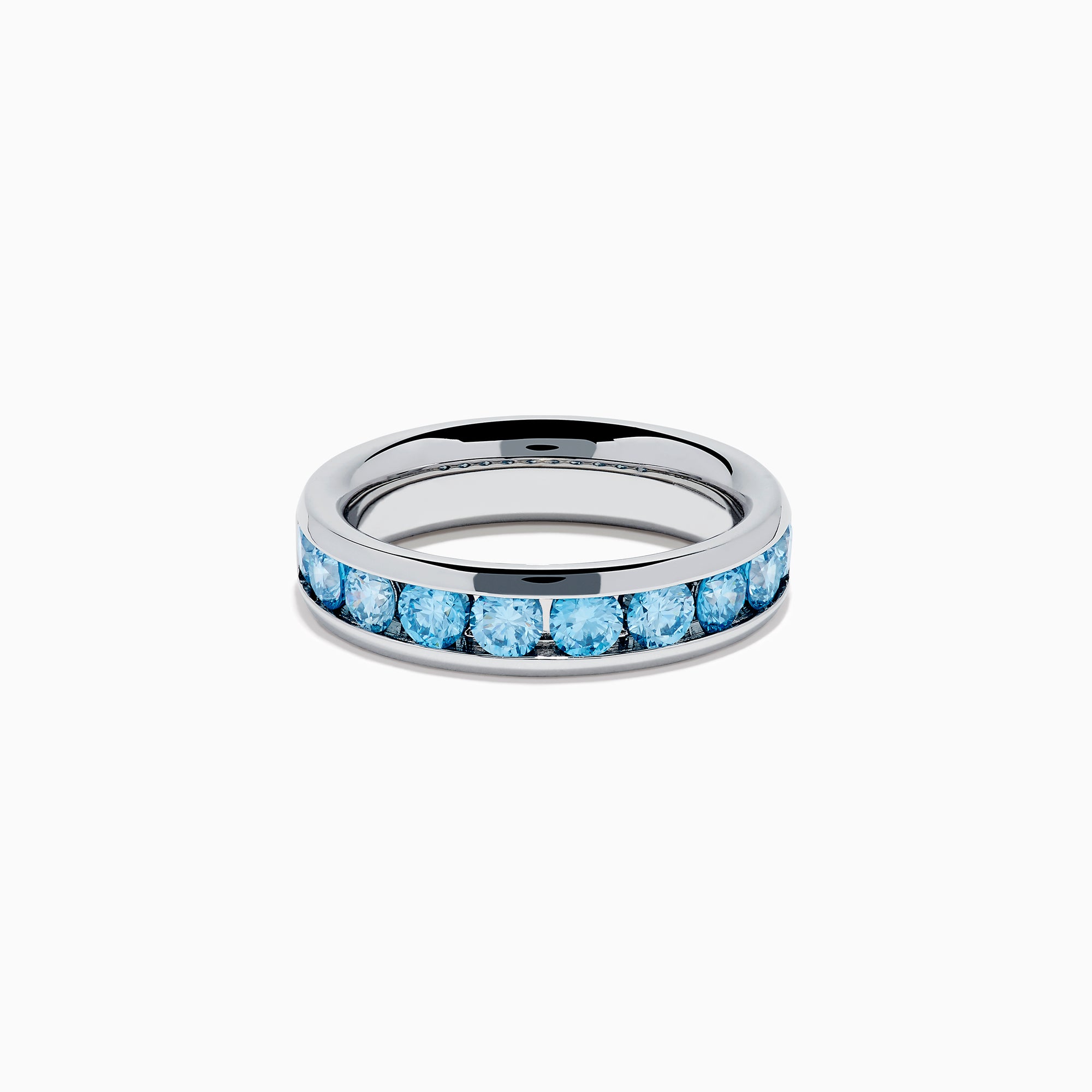 The Lab Grown Blue Diamond Channel Set Band in 14K White Gold features a row of round blue diamonds encircling the band, shown elegantly on a plain white background.