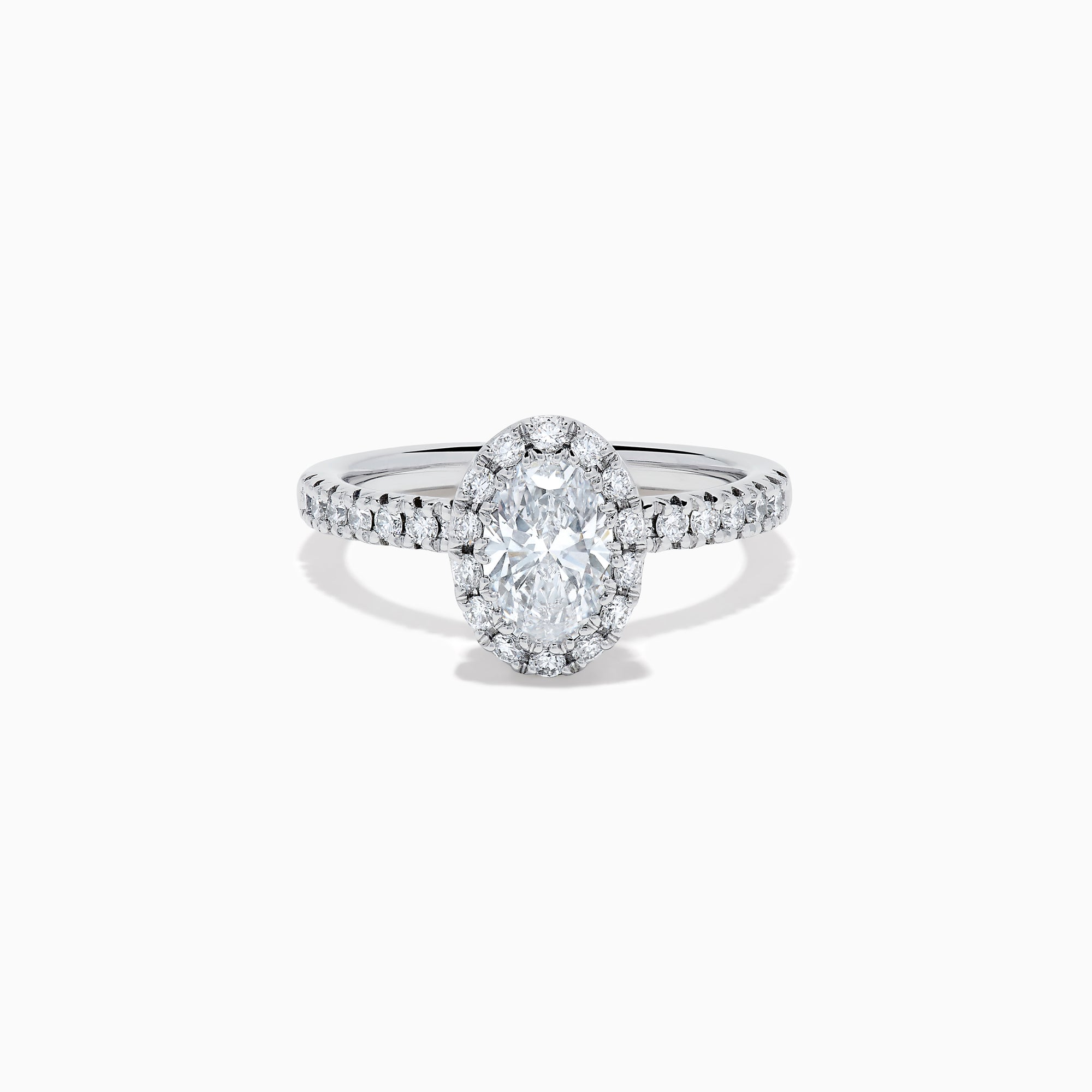 The Lab Grown Oval Diamond Halo and Hidden Halo Ring in 14K White Gold showcases an oval lab grown diamond center, a sparkling diamond halo, hidden halo accents, and additional diamonds along the band.