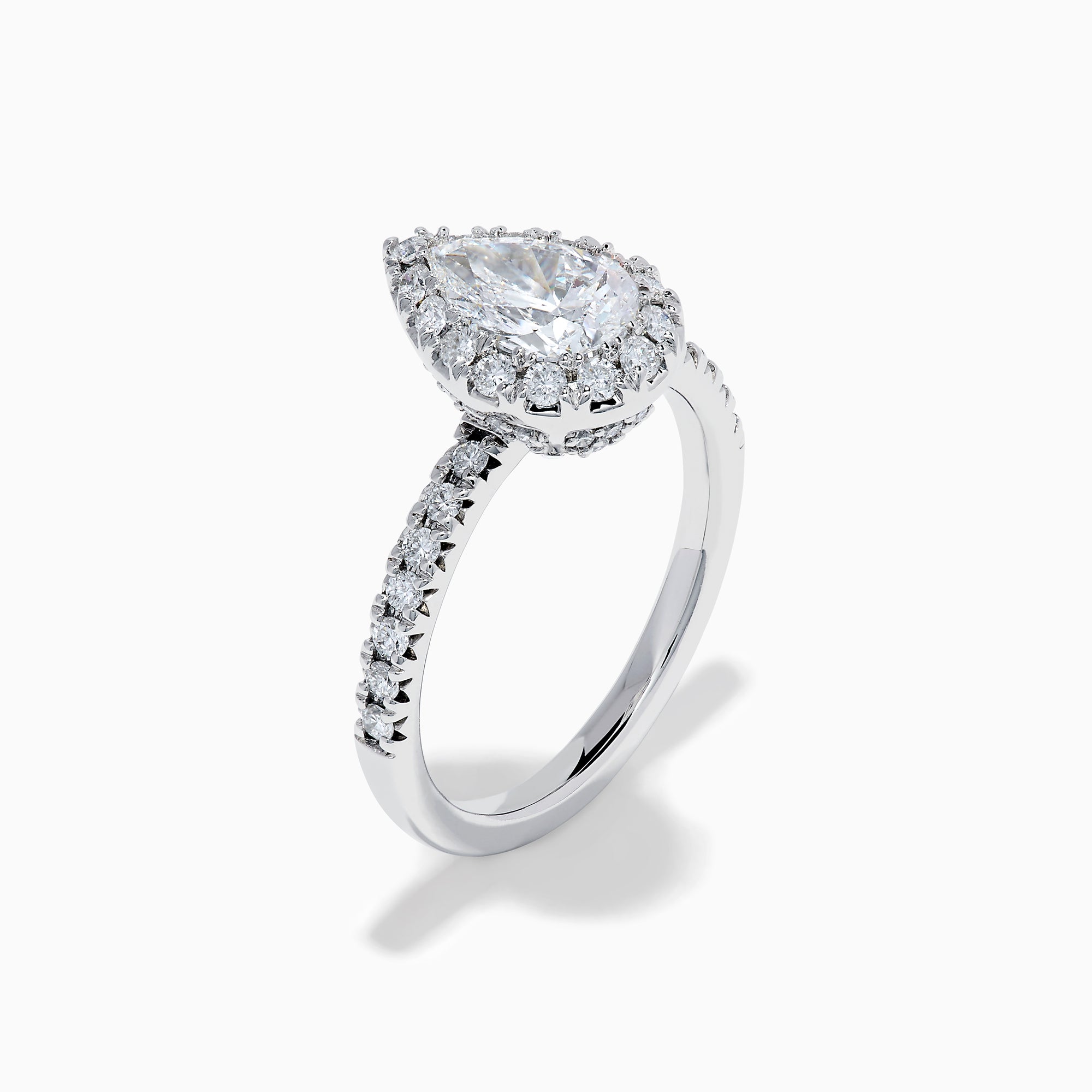 The Lab Grown Pear Diamond Halo and Hidden Halo Ring in 14K White Gold features a lab-grown pear center, a surrounding halo and hidden halo of diamonds on a white gold band, shown against a plain white background.