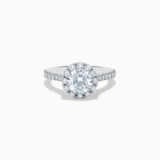 The 14K White Gold Lab Grown Diamond Ring and Band Set features a large round lab grown diamond, surrounded by smaller diamonds on a split shank band encrusted with more diamonds, all shown against a white background.