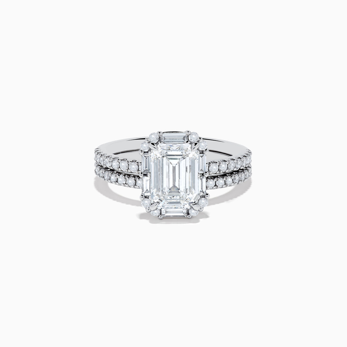 The 14K White Gold Lab Grown Diamond Ring and Band Set features a striking emerald-cut center diamond with round diamonds along the split shank band, shown on a plain white background.