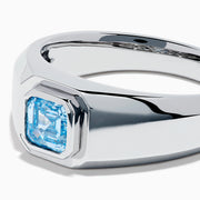 The Men's Lab Grown Blue Diamond Ring in 14K White Gold features a square blue diamond centerpiece, showcased on a clean white background.