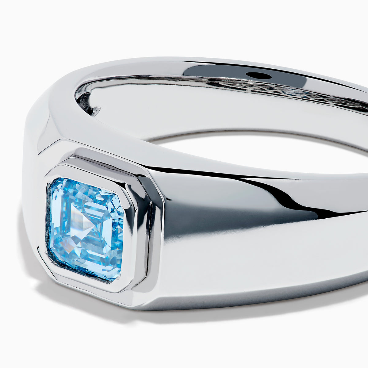 The Men's Lab Grown Blue Diamond Ring in 14K White Gold features a square blue diamond centerpiece, showcased on a clean white background.