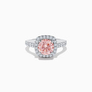 The 14K White Gold Lab Grown Pink and White Diamond Ring features a large oval pink center stone, a halo of lab grown diamonds, and additional diamonds on the band, displayed against a white background.