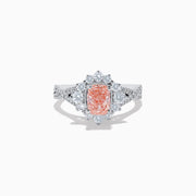 The 14K White Gold Lab Grown Pink and White Diamond Ring features an oval pink center stone, a halo of sparkling white diamonds, and additional lab grown diamonds along the band.